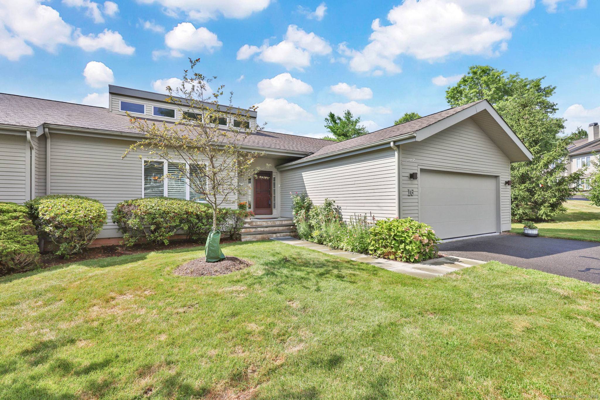 Discover space, style, and low maintenance living in this expansive 4 bedroom, 3.