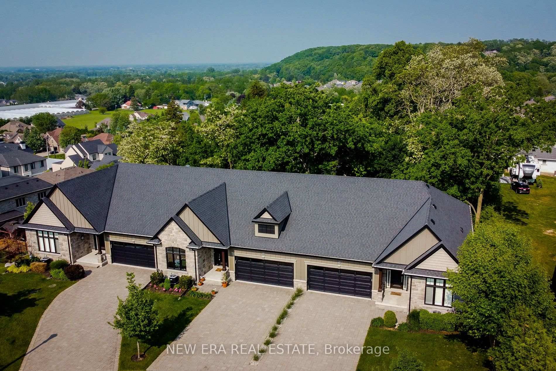 Nestled in the prestigious Tanbark Heights Community, this stunning luxurious bungalow, offers an unparalleled living experience.