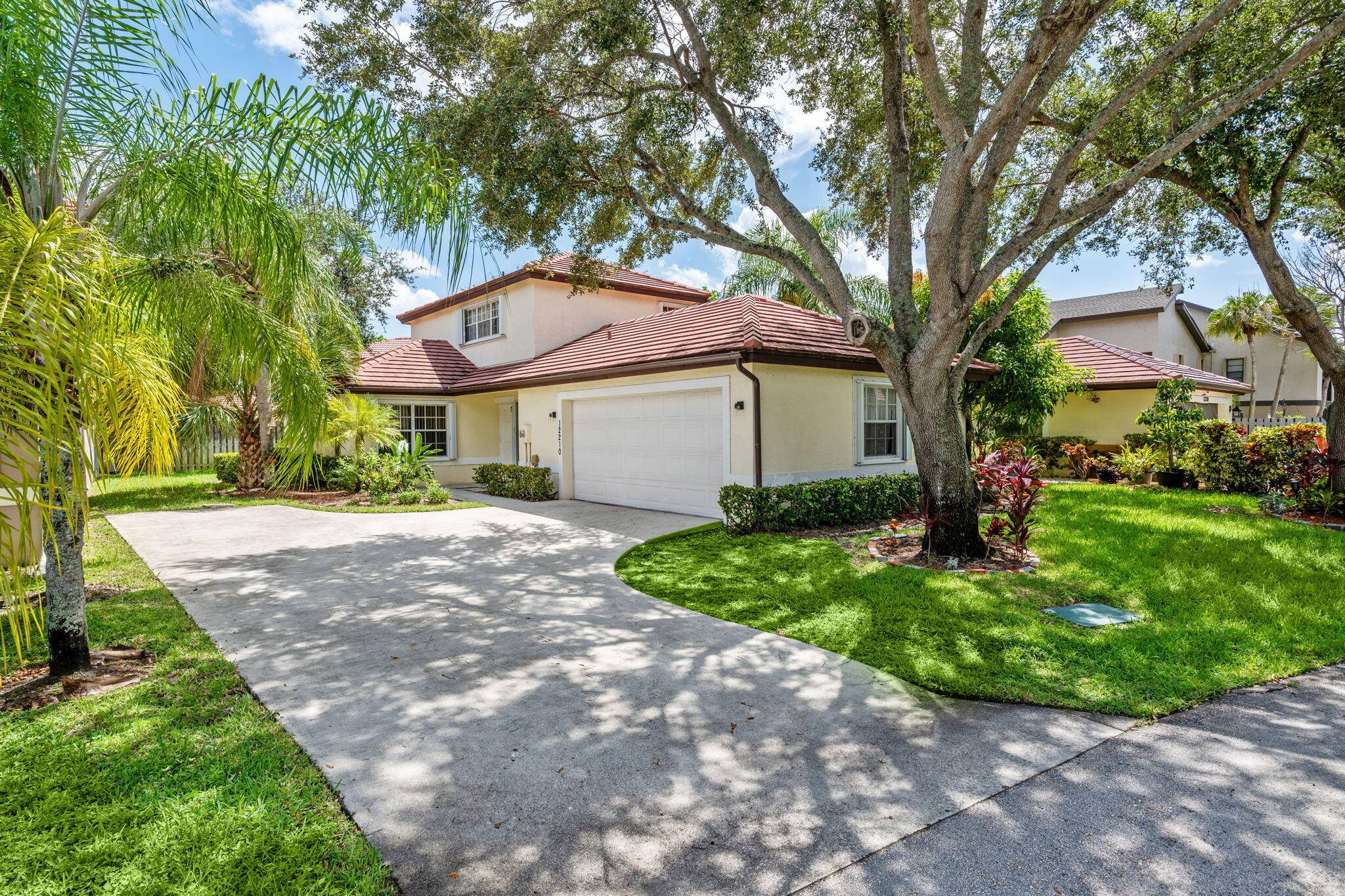 Welcome home to this beautifully maintained single family residence in the heart of Wellington.
