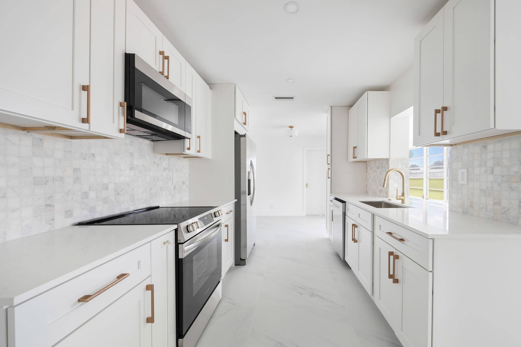 Created with love attention to detail, this newly renovated 2 bed 2 bath home offers a NEW ROOF and beautiful finishes throughout.