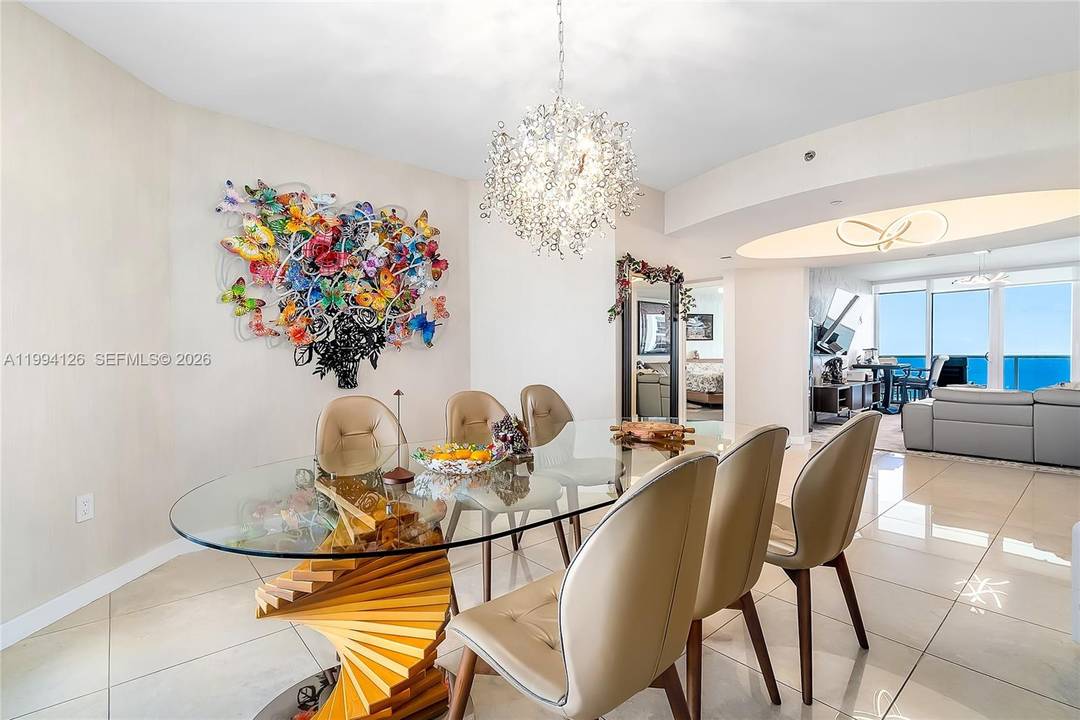 Perched on a high floor in the sky, this fully renovated residence offers sweeping panoramic views of the Atlantic Ocean and the Intracoastal, creating a rare combination of light, space, ...