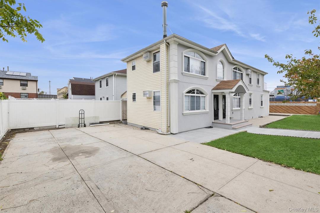 Welcome to This fully renovated two family stucco face frame home sits proudly on a large corner lot and offers modern living across two spacious floors.