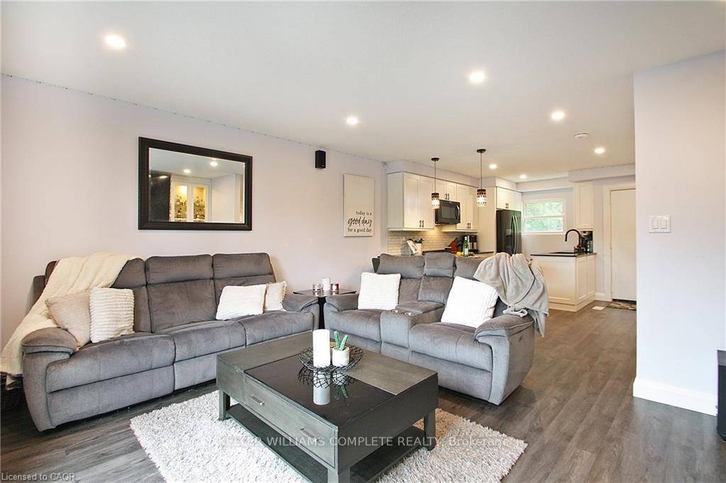 Move right in to this renovated 3 Bedroom, 2 Bathroom Townhouse with 2 Covered Parking Spots.