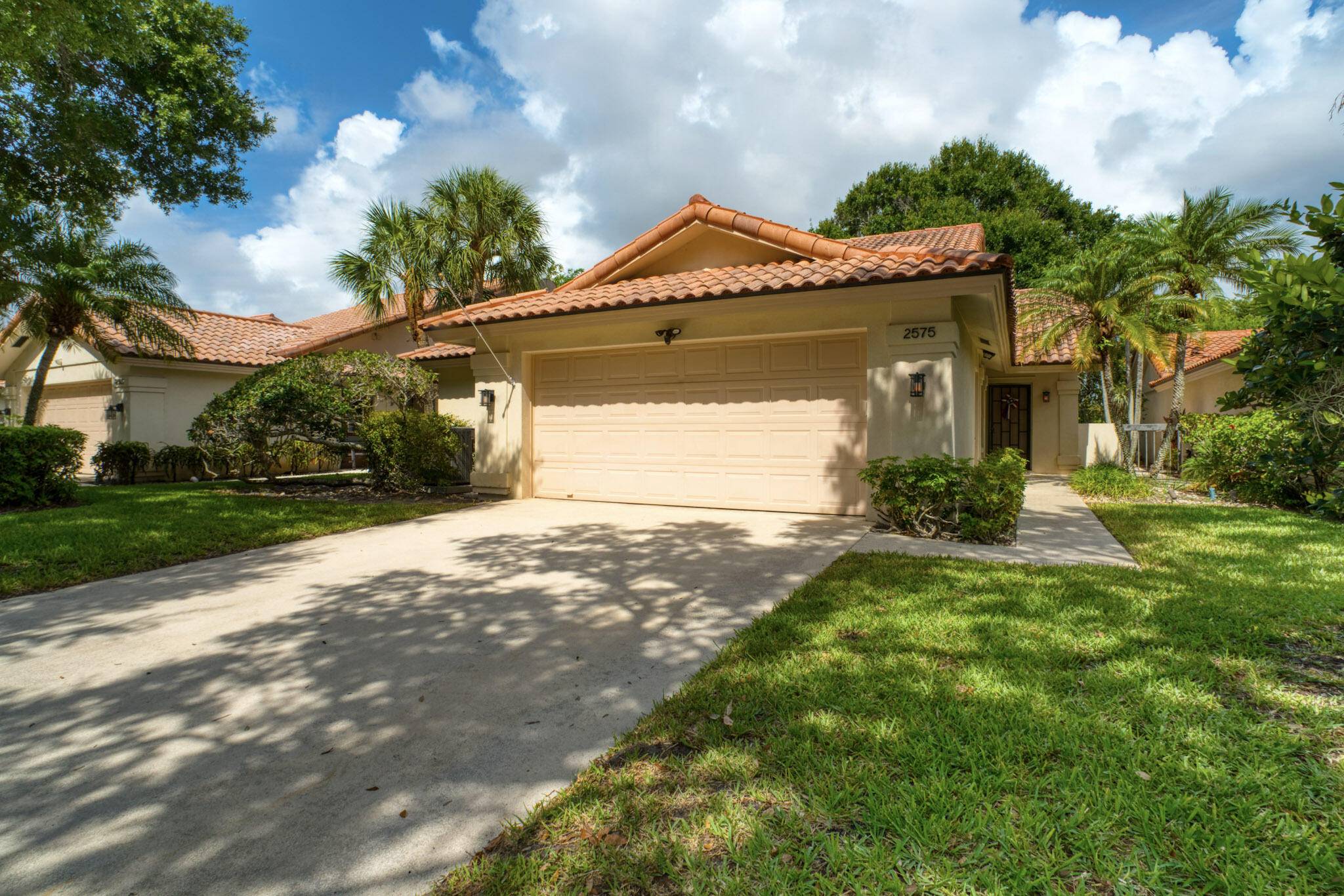 Enjoy the ideal Florida lifestyle in this built solid DiVosta home situated in the beautiful Villages of Palm Beach Lakes.