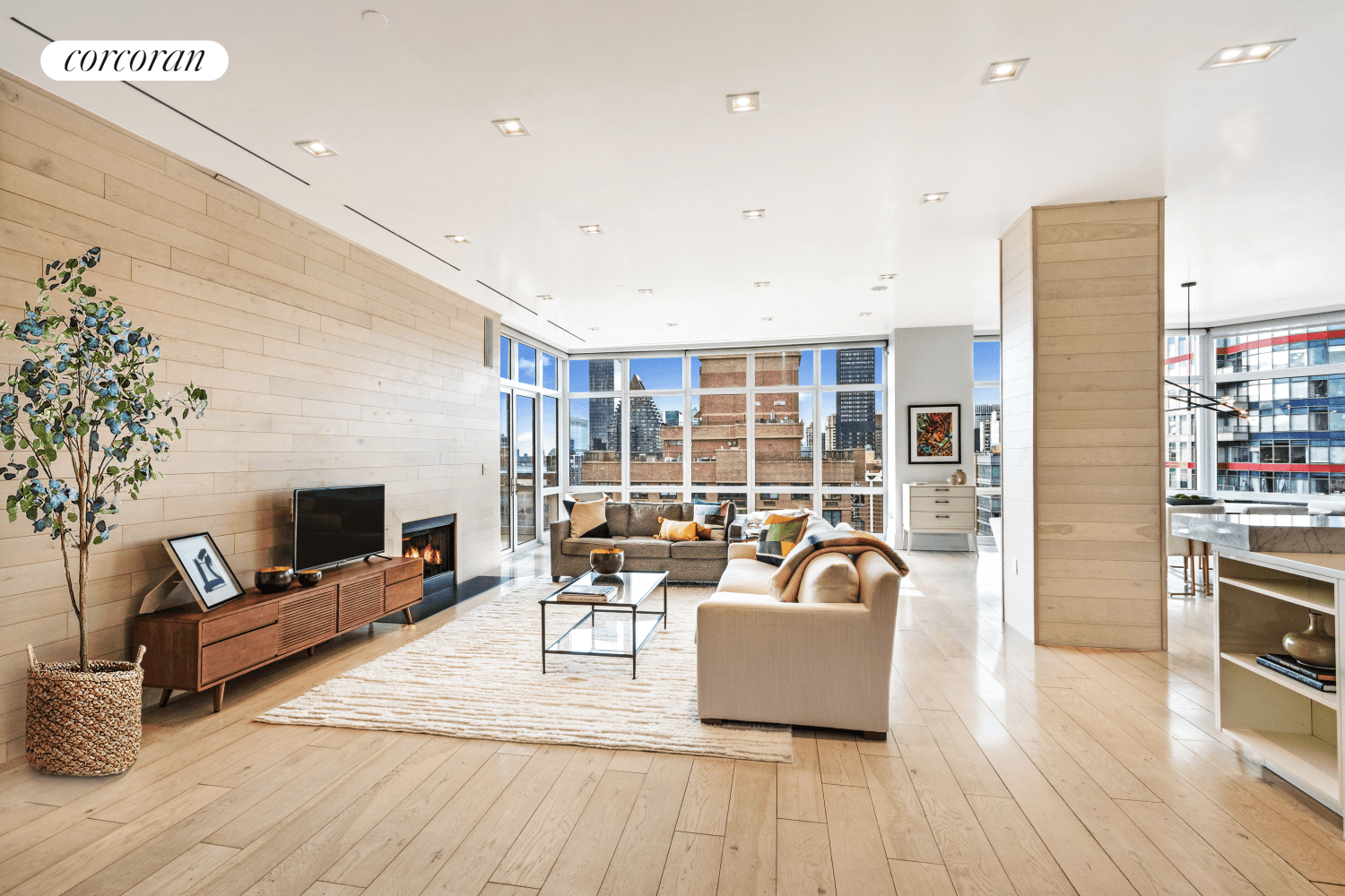 Penthouse B at the Milan Condominium offers City skyline and East River views with natural light from south, east and west exposures.