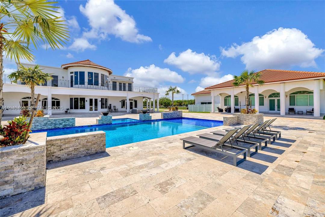 Discover this extraordinary private oasis located within Southwest Ranches.