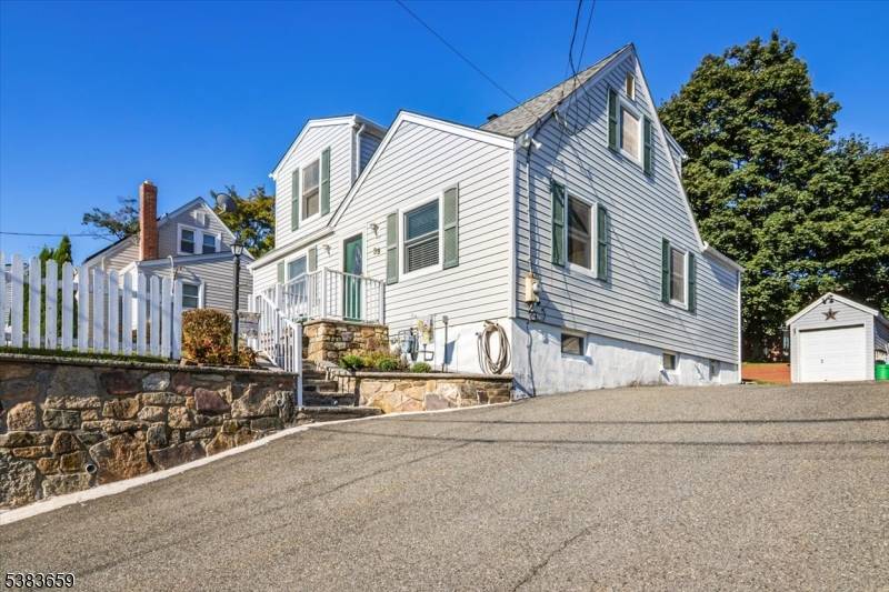 Welcome to this charming 3 bedroom, 2 bath Cape Cod style home in the heart of desirable Rockaway Borough.