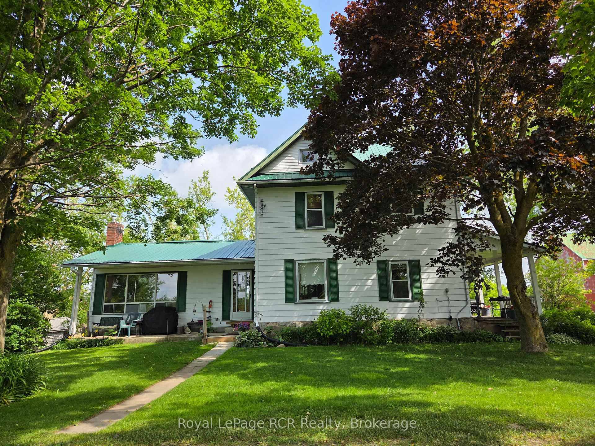 Charming 1903 Farmhouse on 151 Scenic Acres in Grey County.