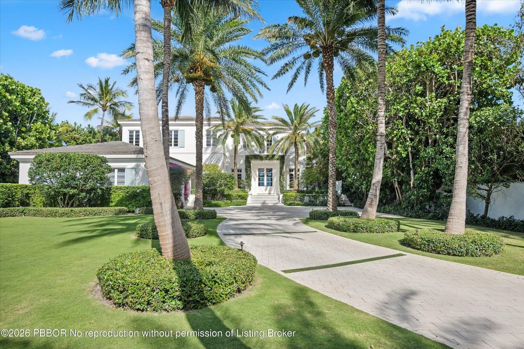 Gated Oceanfront Estate completely rebuilt in 2017 is set high above the dune on one of Gulf Stream's most desirable beaches.