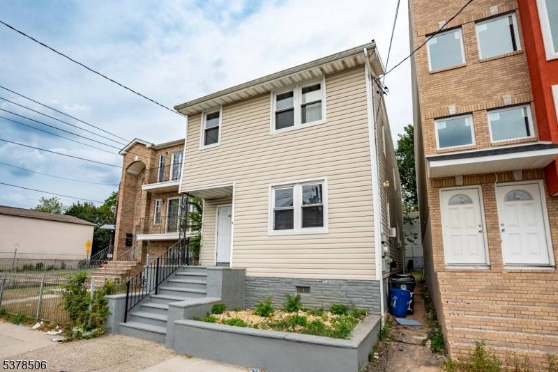 Spacious renovated Multi Family home in Prime Newark Location Perfect for First Time Buyers in the heart of Newark !