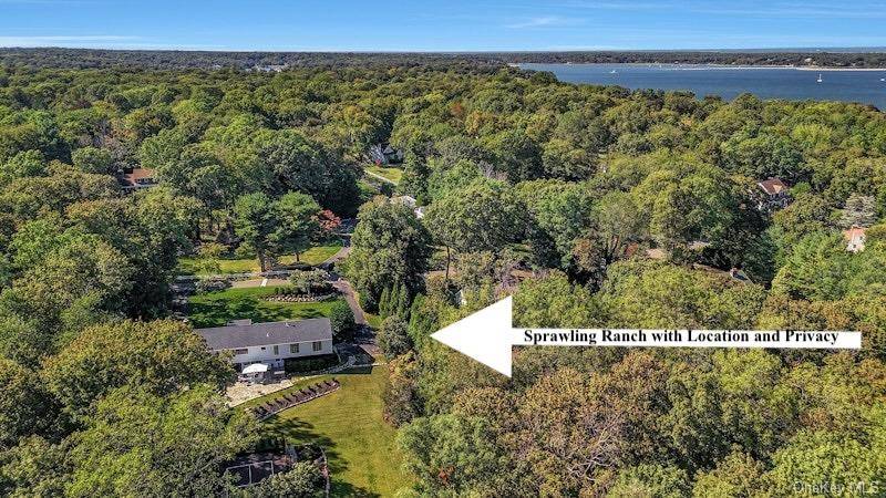 Experience the pinnacle of luxury at 262 Huntington Bay Road, Huntington Bay, NY an exquisite raised ranch that embodies sophisticated living.