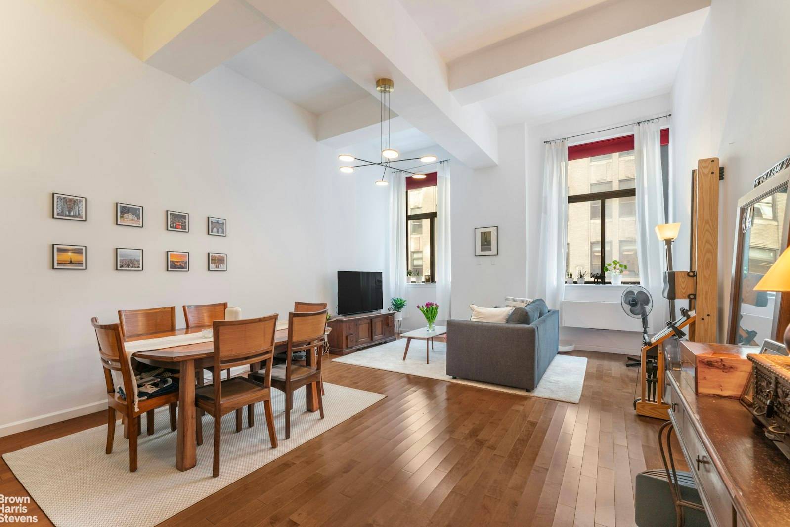 Beautiful loft style living with open living room dinning and 11 ft ceiling.