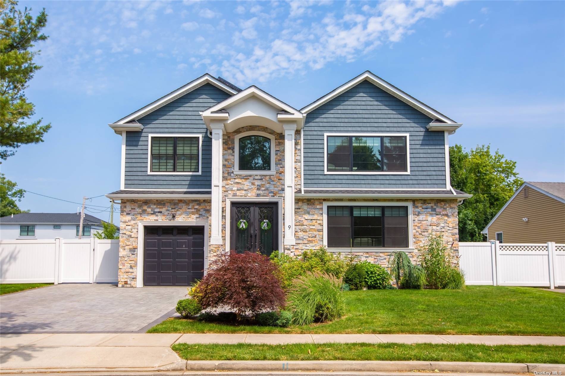 Welcome to this exquisite colonial nestled in the highly desired Syosset Greens !