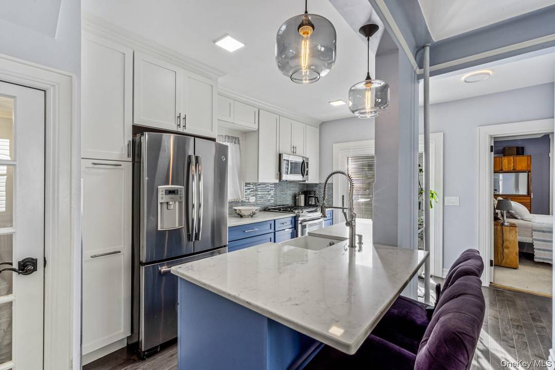 Rare and Charming Legal 2 Family Flushing Residence Welcome to 171 06 Bagley Avenue, a beautifully maintained two family residence in the heart of Flushing, Queens.