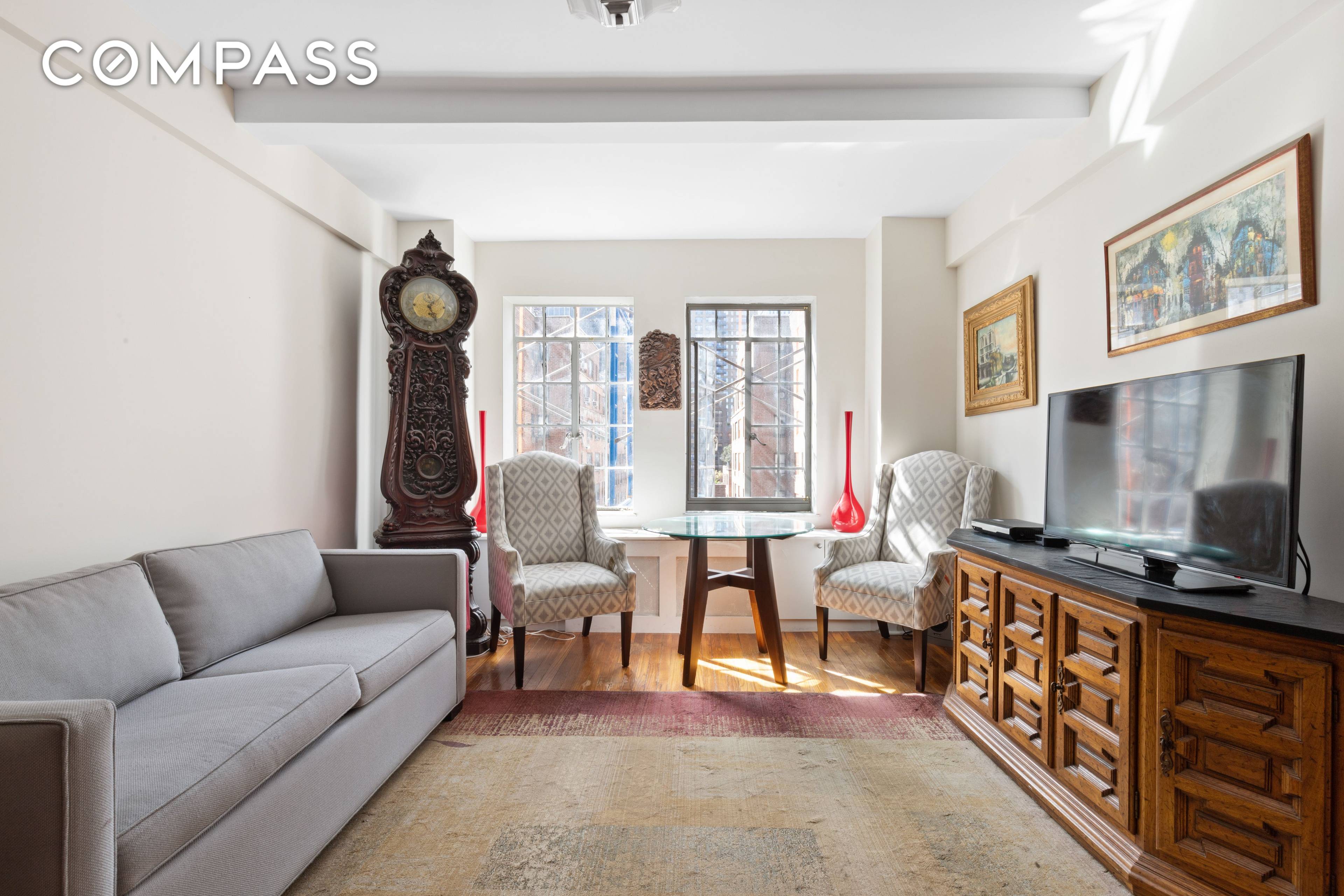 Sun filled and pin drop quiet corner 1 Bedroom 1 Bathroom with pre war charm, high beamed ceilings, molding, built in cabinets, marble window sills, and original floors is a ...