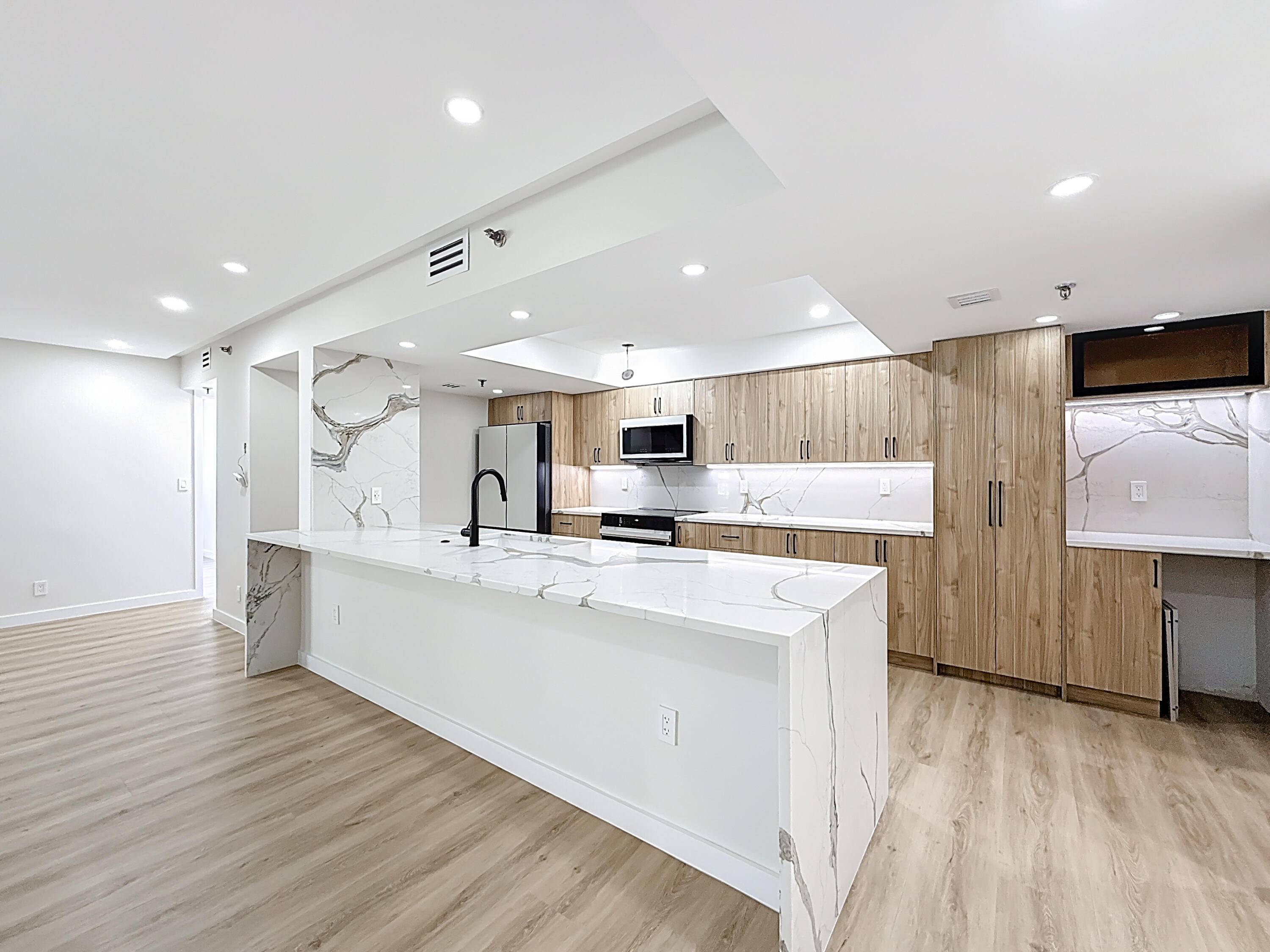 Fully remodeled 2BR 2BA residence featuring 150K in upgrades, new appliances, and designer finishes throughout.