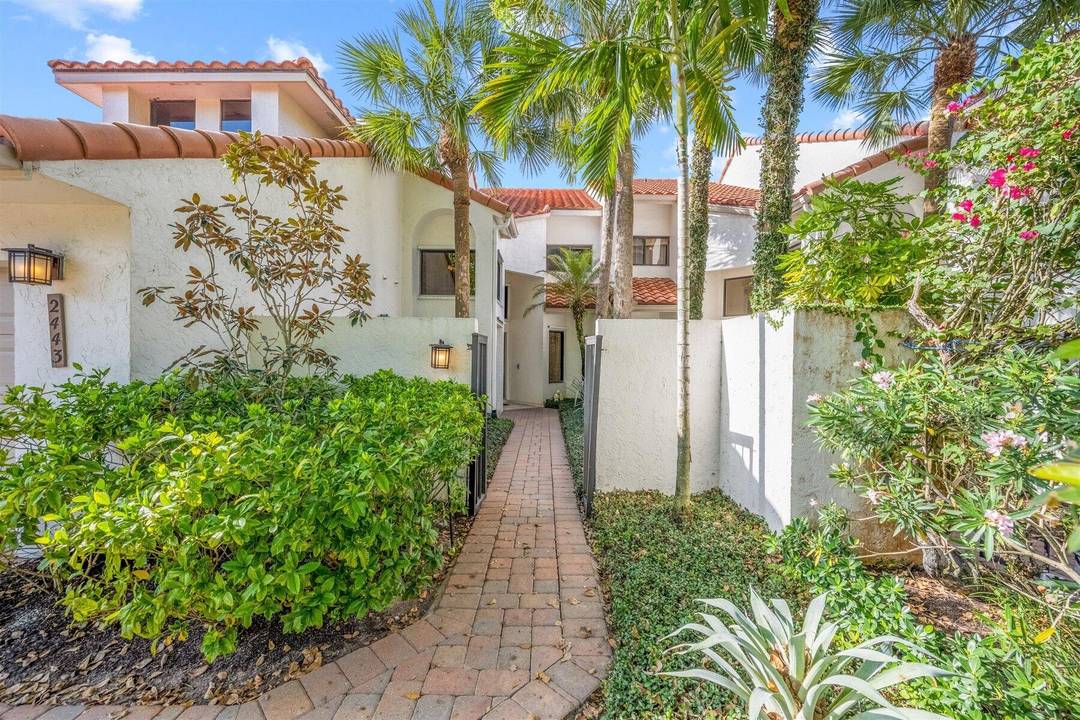Elegantly appointed freshly painted two story Town House in the lovely Windsor Way neighborhood in Palm Beach Polo.