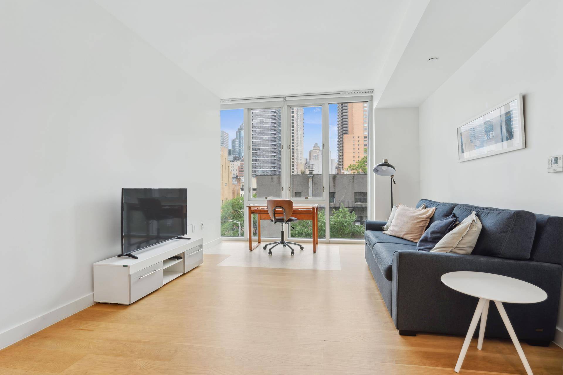 New to Market at the Clare Condominium This is a FURNISHED East facing One Bedroom, One bath with Coveted Washer Dryer in Unit.