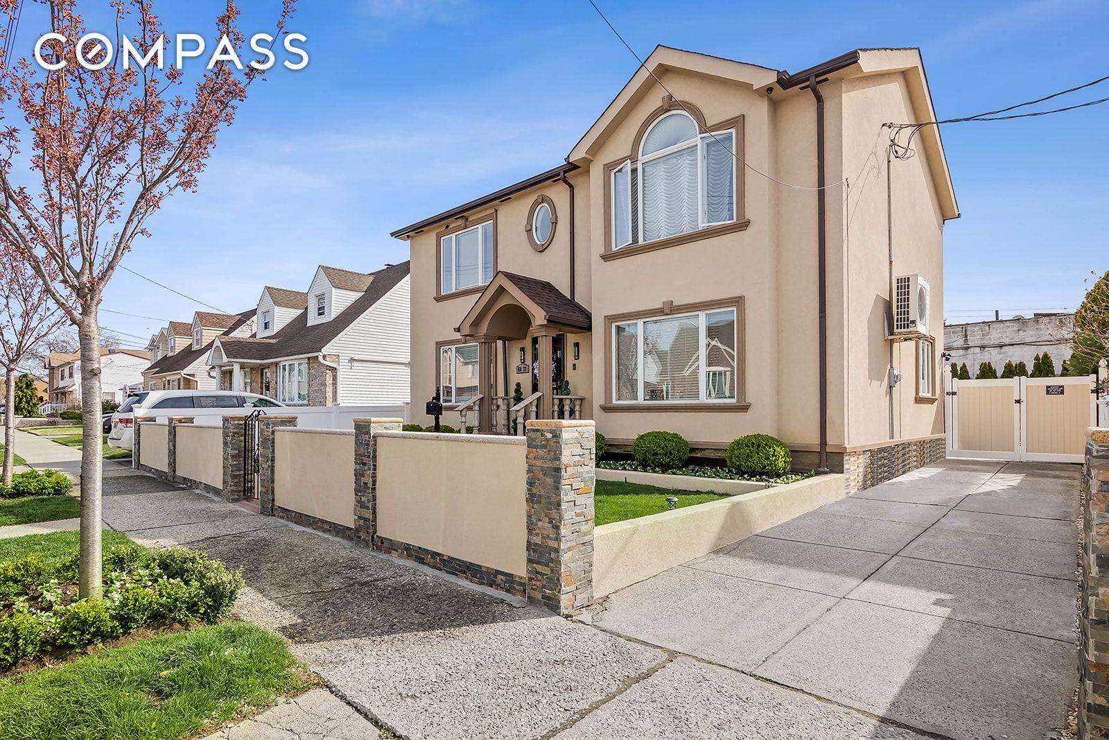 Price Adjustment ! This elegant Center Hall Colonial offers everything you can dream of.