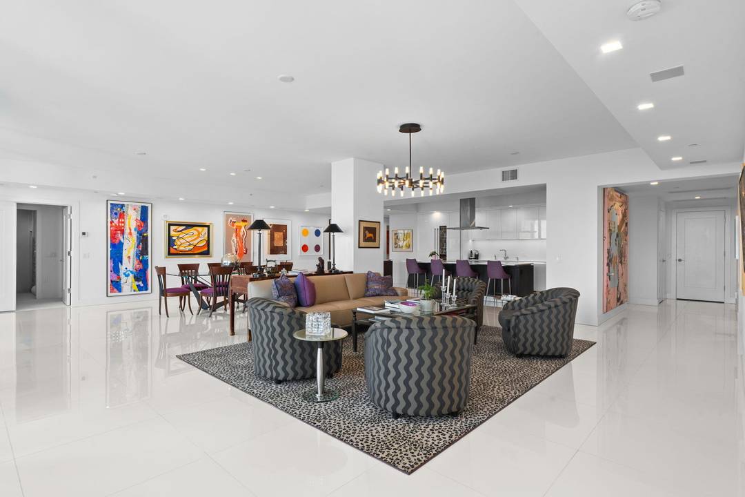 Experience the pinnacle of Luxury Living in this rare customized residence at Akoya within Boca West Country Club.