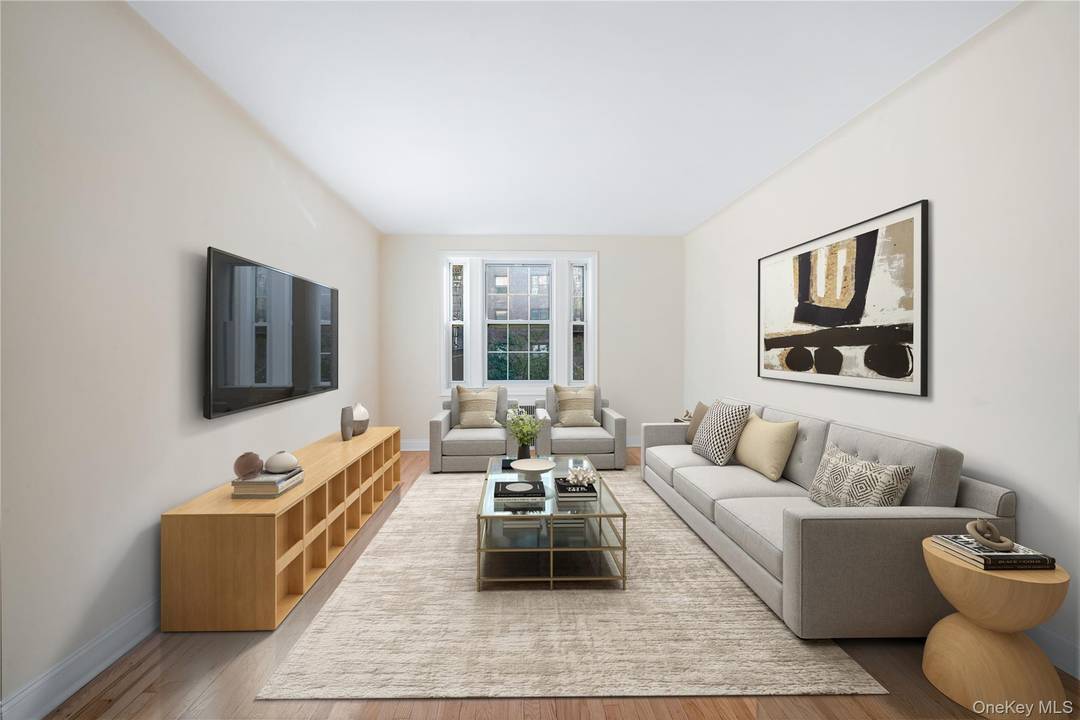 This well appointed completely remodeled turn key apartment has two large equal size bedrooms, high ceilings, and original oak flooring, in the gorgeous Wakefield.