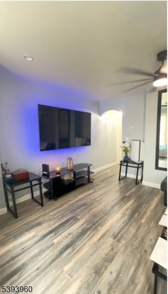 Renovated 2 family home featuring a living room and one bathroom on the first floor, a modern kitchen with brand new stainless steel appliances, and access to a fully finished ...