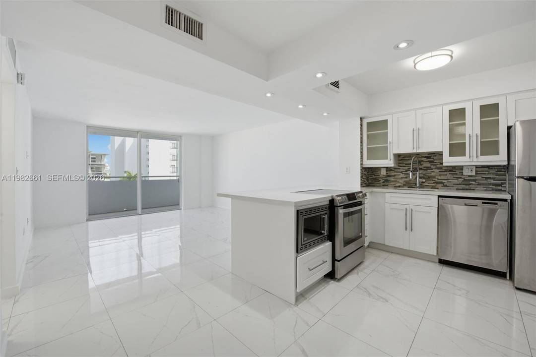 Perched in the middle of a desirable and secluded south beach neighborhood, Residence 703 at 1658 Bay Road offers refined Miami Beach living with breathtaking sunrise and skyline views.