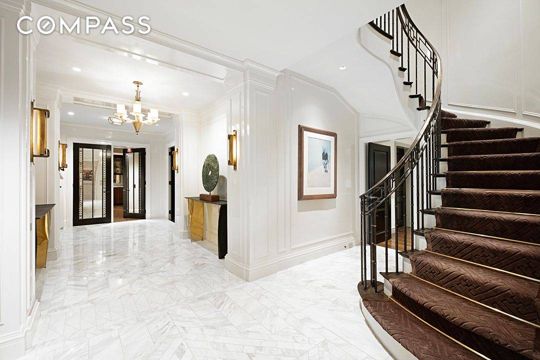 Ideally located on East 71st Street and situated in one of Park Avenue s most prestigious and sought after pre war cooperatives, this triple mint high floor duplex residence is ...