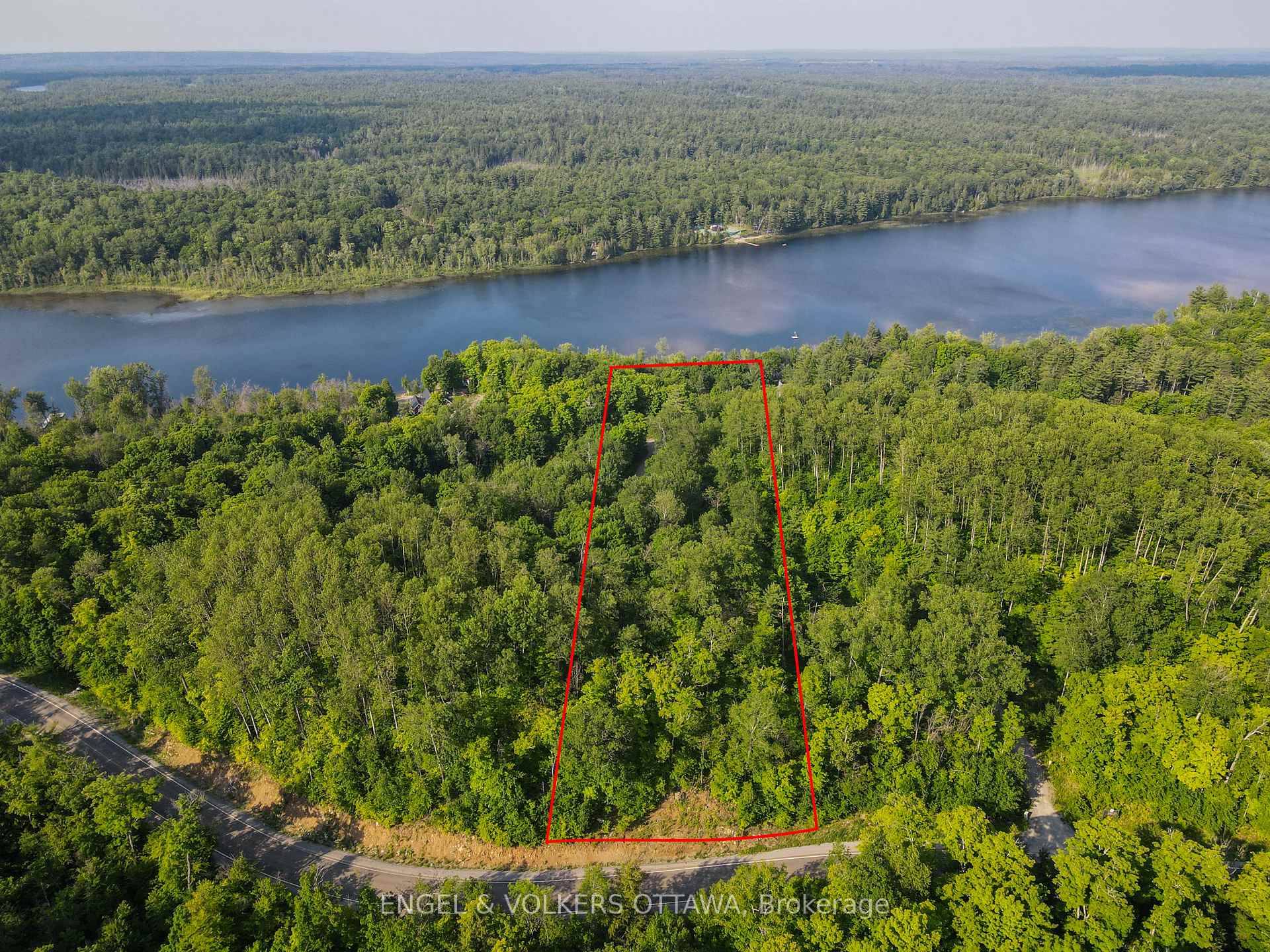 This lot offers over 4 acres of land, with beautiful water frontage of Ferguson Lake, and easy access through Ferguson Lake Road and the quaint Hidden Lane.
