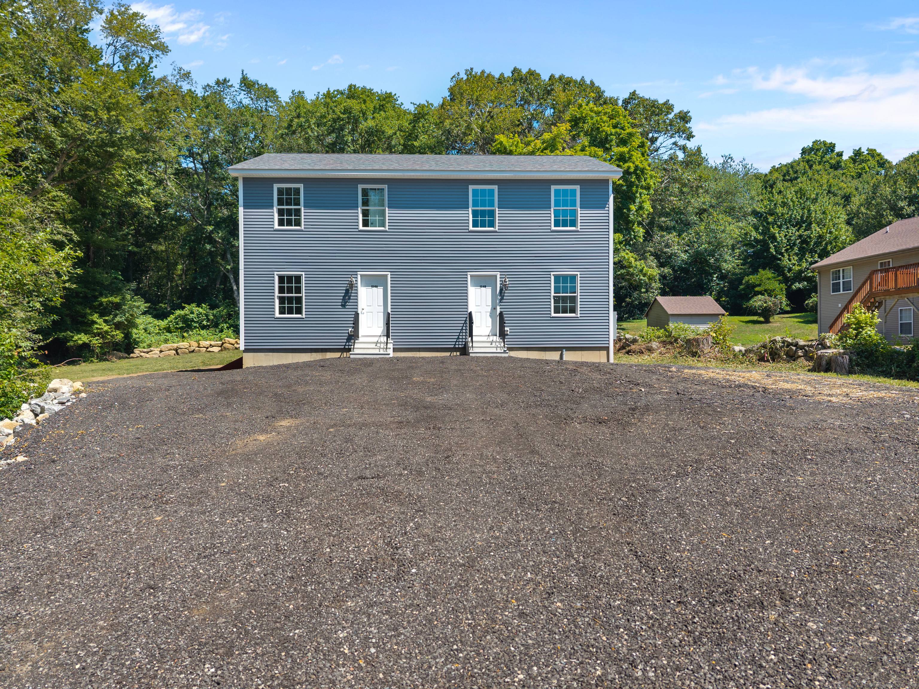 Be the first to own this brand new side by side duplex in the heart of Groton, set back from the road in a private setting !