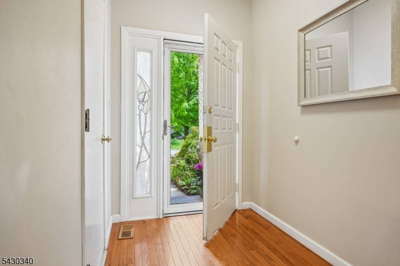 WELCOME HOME to this immaculately kept townhome in the sought after Madison Commons community !