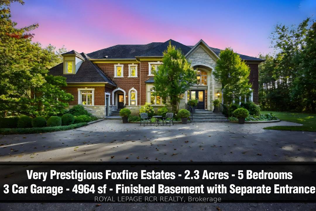 Dream big ! Builders own 4964sf custom 5 bedroom estate with separate entrance to professionally finished basement and 3 car garage on 2.