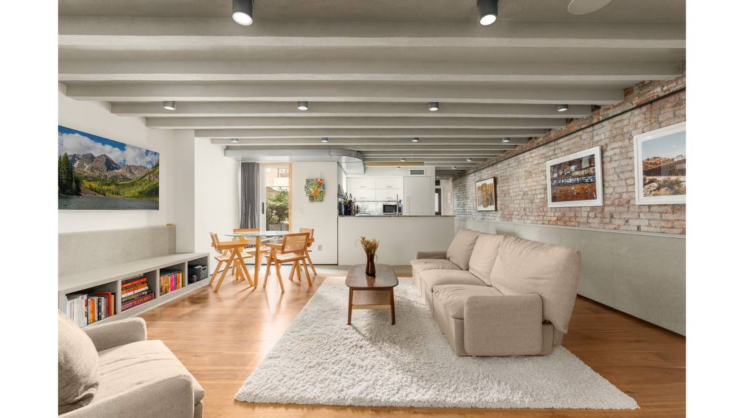 Welcome to apartment GB at 357 West 29th Street, a beautifully renovated garden duplex that blends custom design with modern comfort in an intimate Chelsea cooperative.