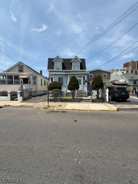 Welcome to 92 Lewis St, a move in ready gem nestled in the heart of Paterson !