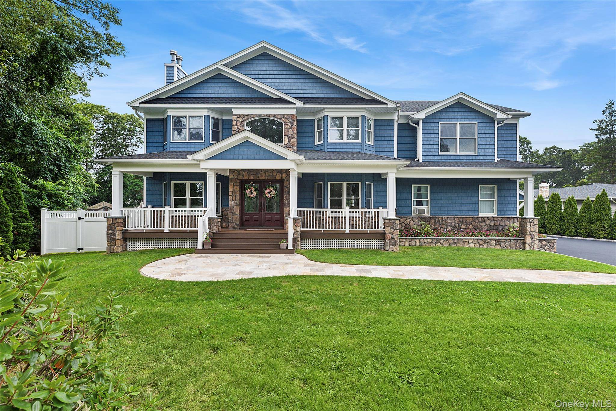 Welcome to THE PINES, experience exceptional resort style living in this custom Smithtown home featuring a fully updated exterior with redesigned roofline, 30 year roof, flat fenced backyard, and professional ...