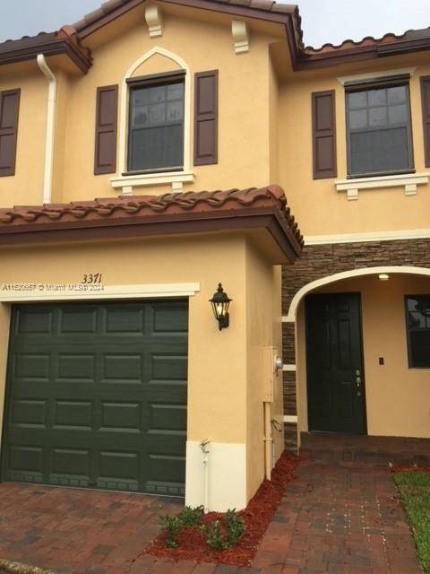 3 bedroom 2. 5 bath townhouse with a 1 car garage.