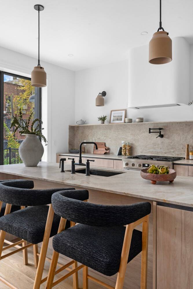 Step into a world of elevated living with this exceptional 20 foot wide, 3, 551 square foot Brooklyn estate a masterfully reimagined two family townhouse that fuses classic elegance with ...