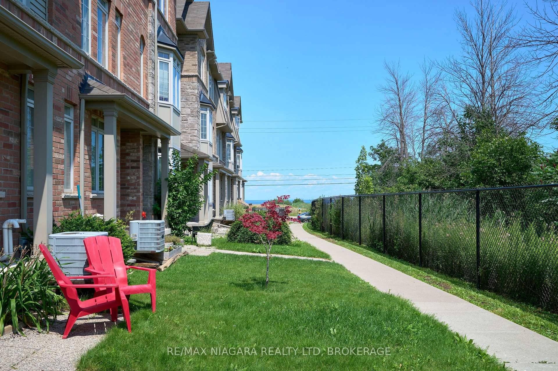 This beautiful three storey townhouse, situated right near the lake, and just minutes from the highway, has three spacious bedrooms, and three and a half bathrooms.