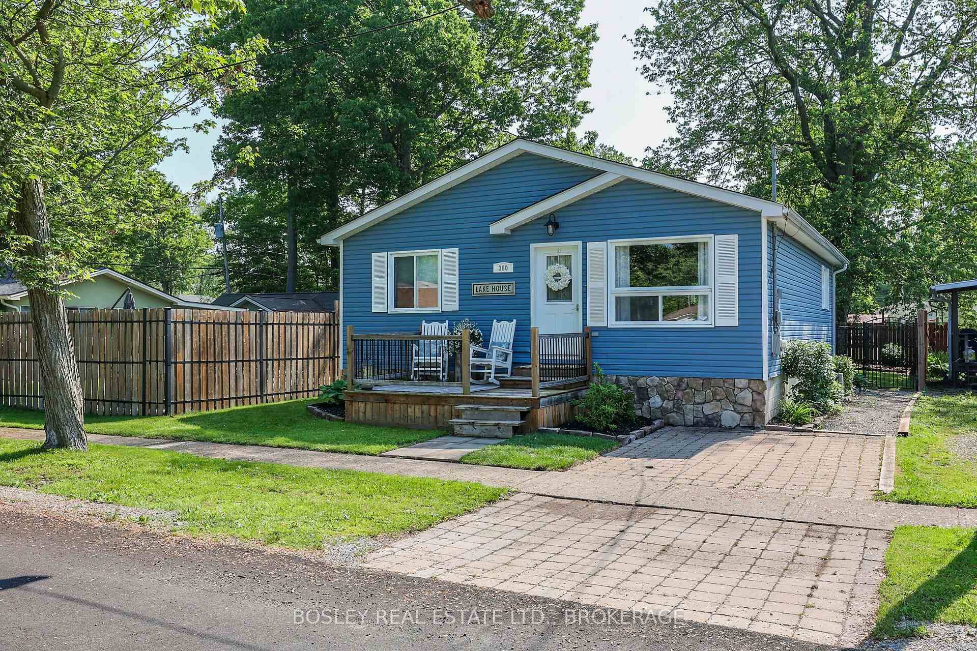 Located within a block of the white sand shores of Lake Erie, this updated bungalow is the quintessential Beach House.