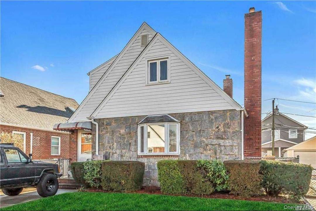 Charming Cape Style Home In East Williston Schools.