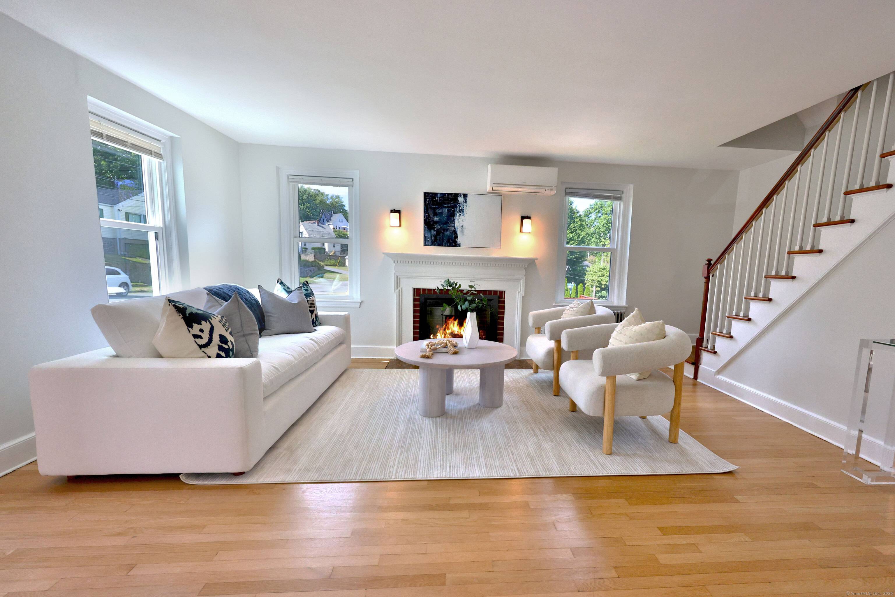 Sun Drenched Charmer ! This move in ready 2 bedroom home offers an open floor plan with plenty of room to expand and gleaming hardwood floors throughout.