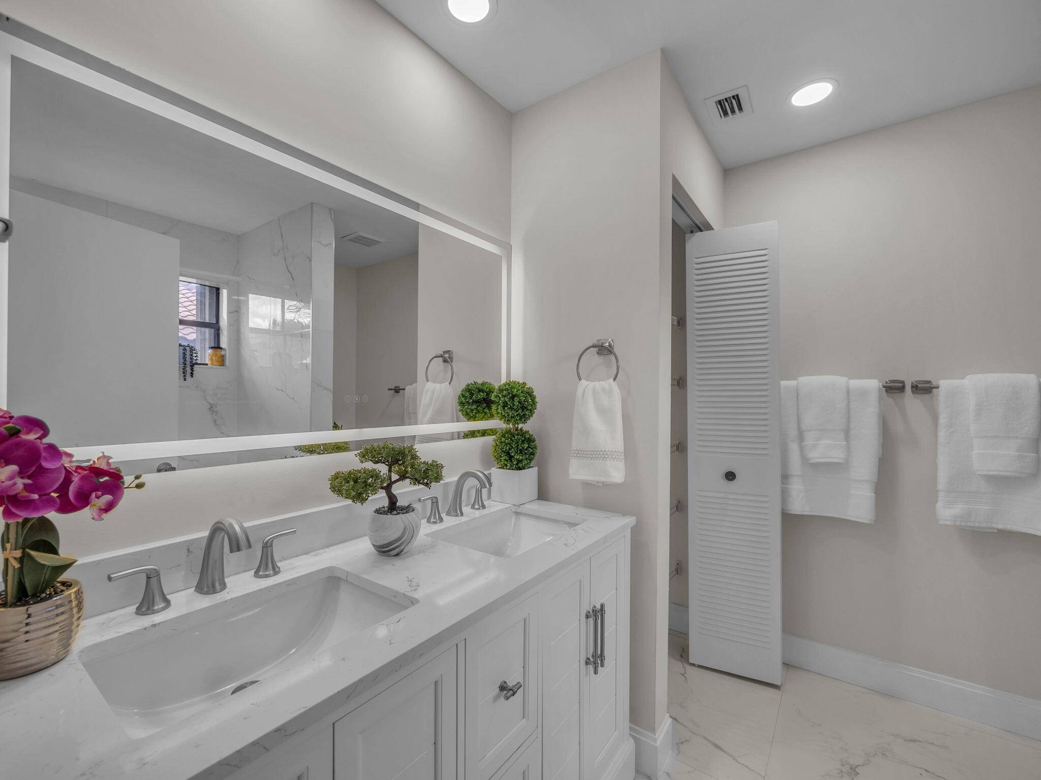 JUST RENOVATED 3 BEDROOM 2STORY HOME WITH 2 1 2 BRAND NEW BATHS AND A 2 CAR GARAGE.