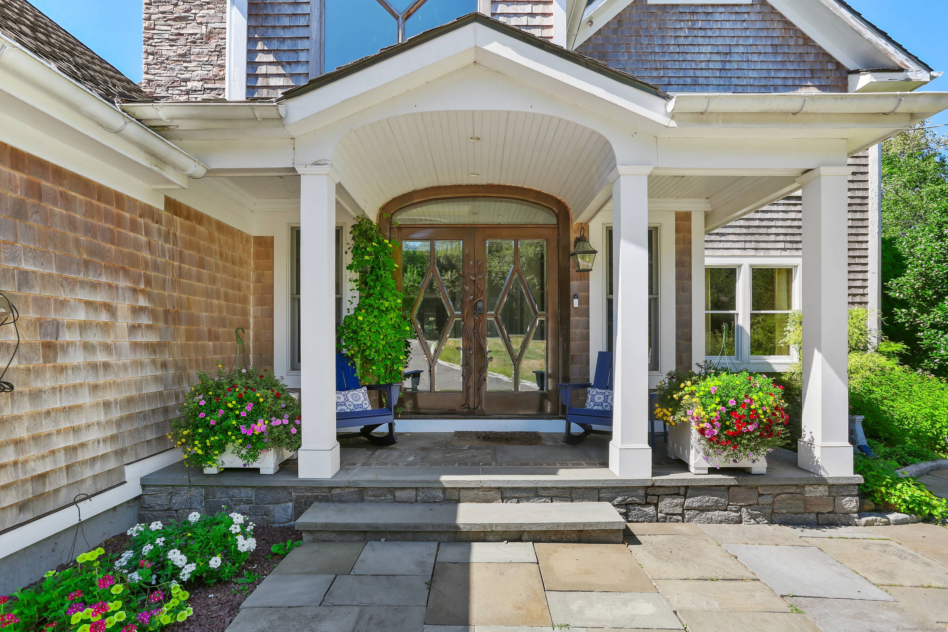 Prepare to be captivated by 6141 Main Street, a stunning craftsman style Colonial where luxury, comfort style come together in perfect harmony.
