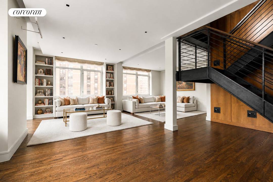 Expansive 4 Bedroom Duplex with Home Office 5th Bedroom and Panoramic Skyline Views This exceptional 4 or 5 bedroom, 3.