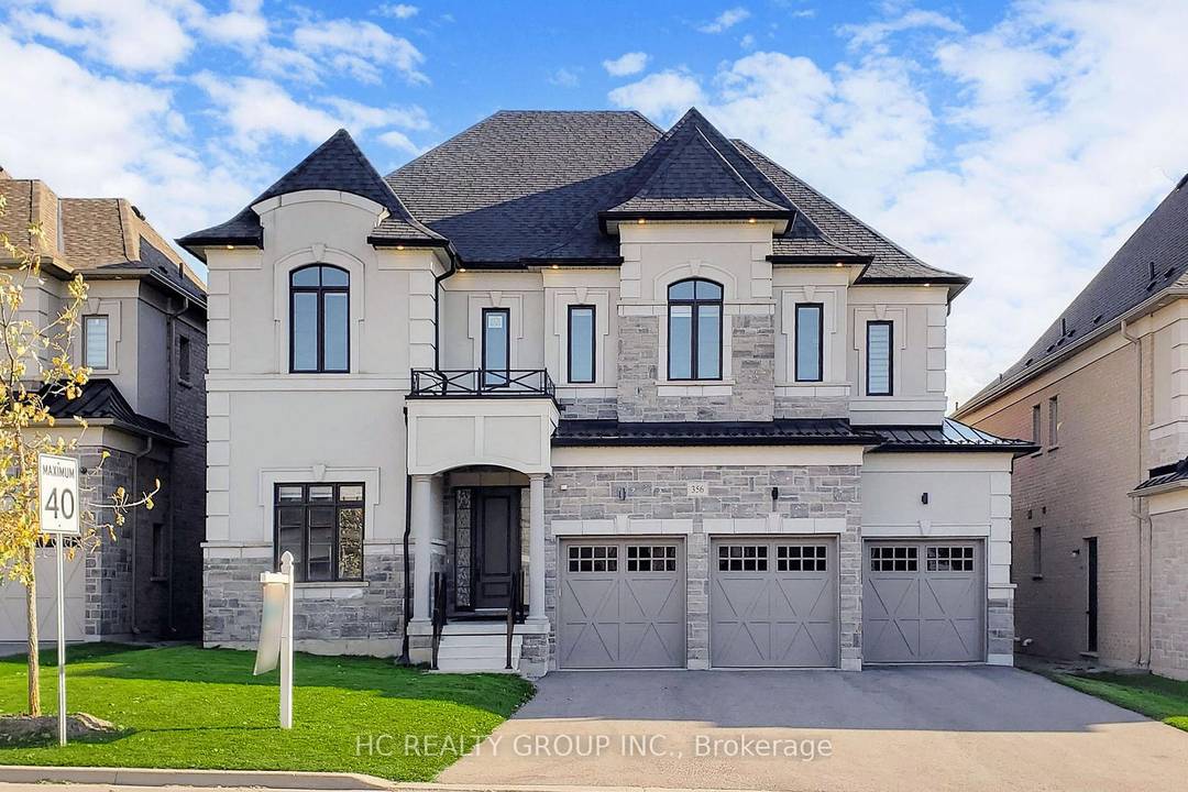 Less than 5 year new luxury 3 car garage detached home on a premium 60 ft lot, backing onto the prestigious National Golf Club !