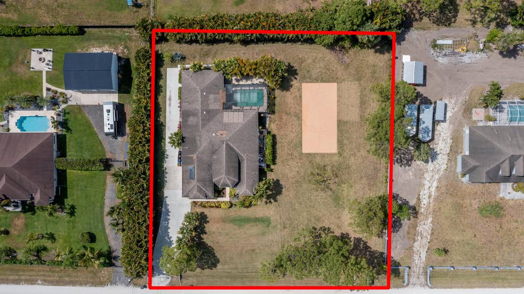 A rare find in West Palm Beach sprawling lot, no HOA, and a residence with incredible upside.