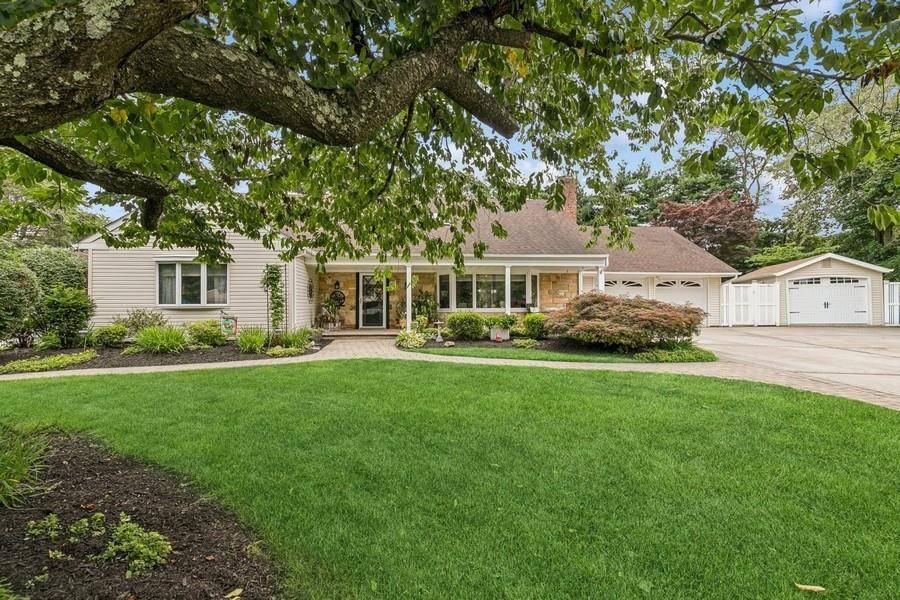 Spacious one of a kind expanded farm ranch with income possibilities set in a private oasis !