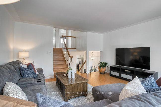Step into a spacious, home with huge family room, with walk out to deck sunny west facing fenced yard.