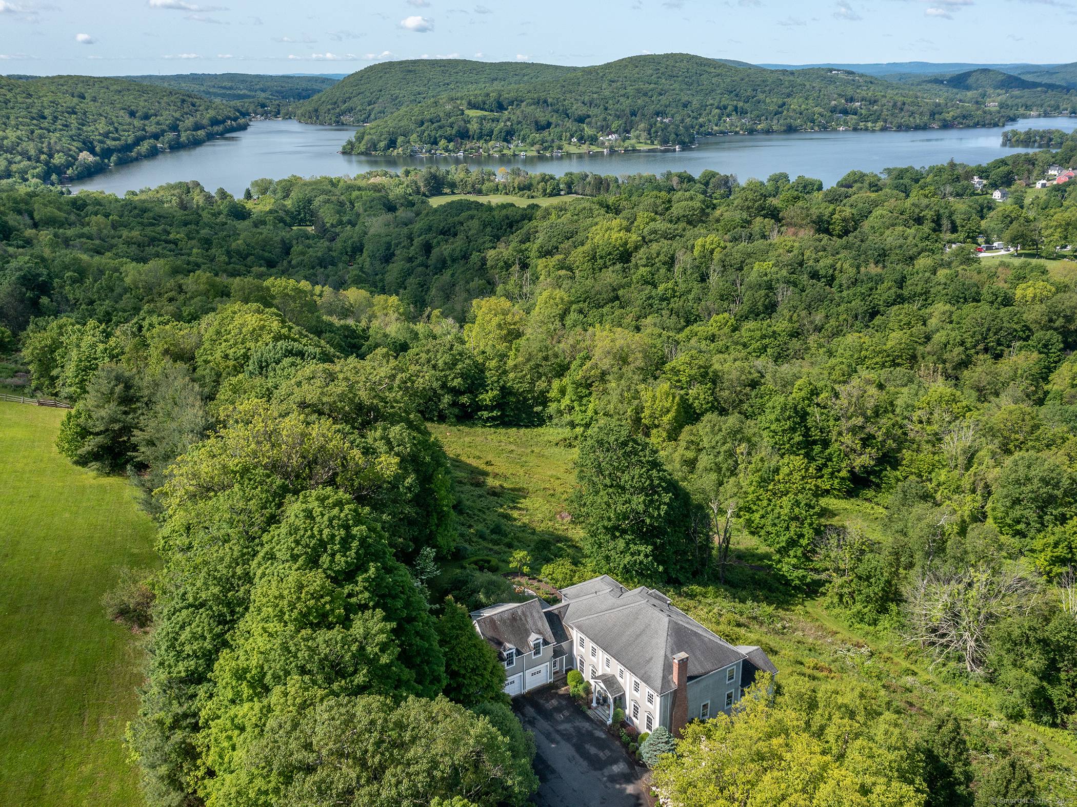 Sept 2025 to May 2026 furnished rental with stunning long southern and western views of Lake Waramaug and the Litchfield Hills !