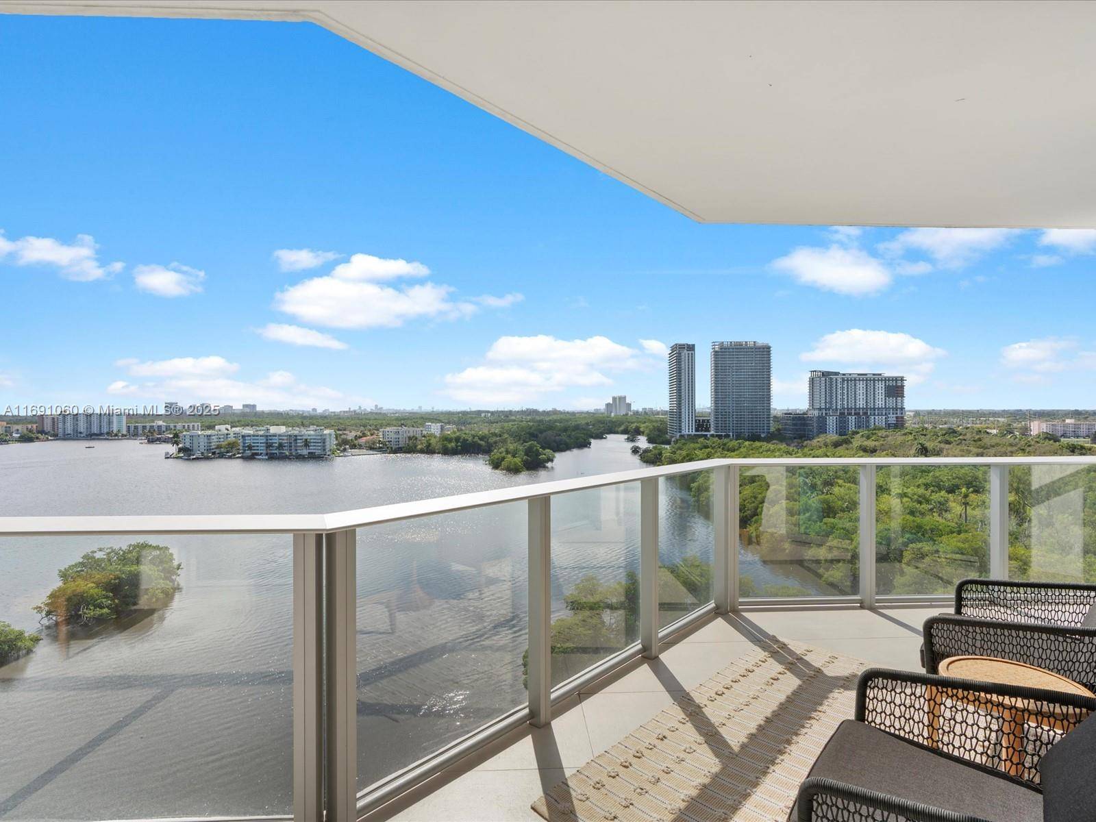 Gorgeous southeast facing 2 bedroom, 3 bathroom residence plus den studio in the prestigious South Tower of Marina Palms, with direct bay and intracoastal views and two adjacent parking spaces.